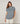 Jersey jaspeado largo, cuello alto, manga corta - Azul
